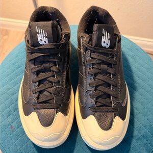New Balance Men's Black Leather Sneakers with Cream Accents